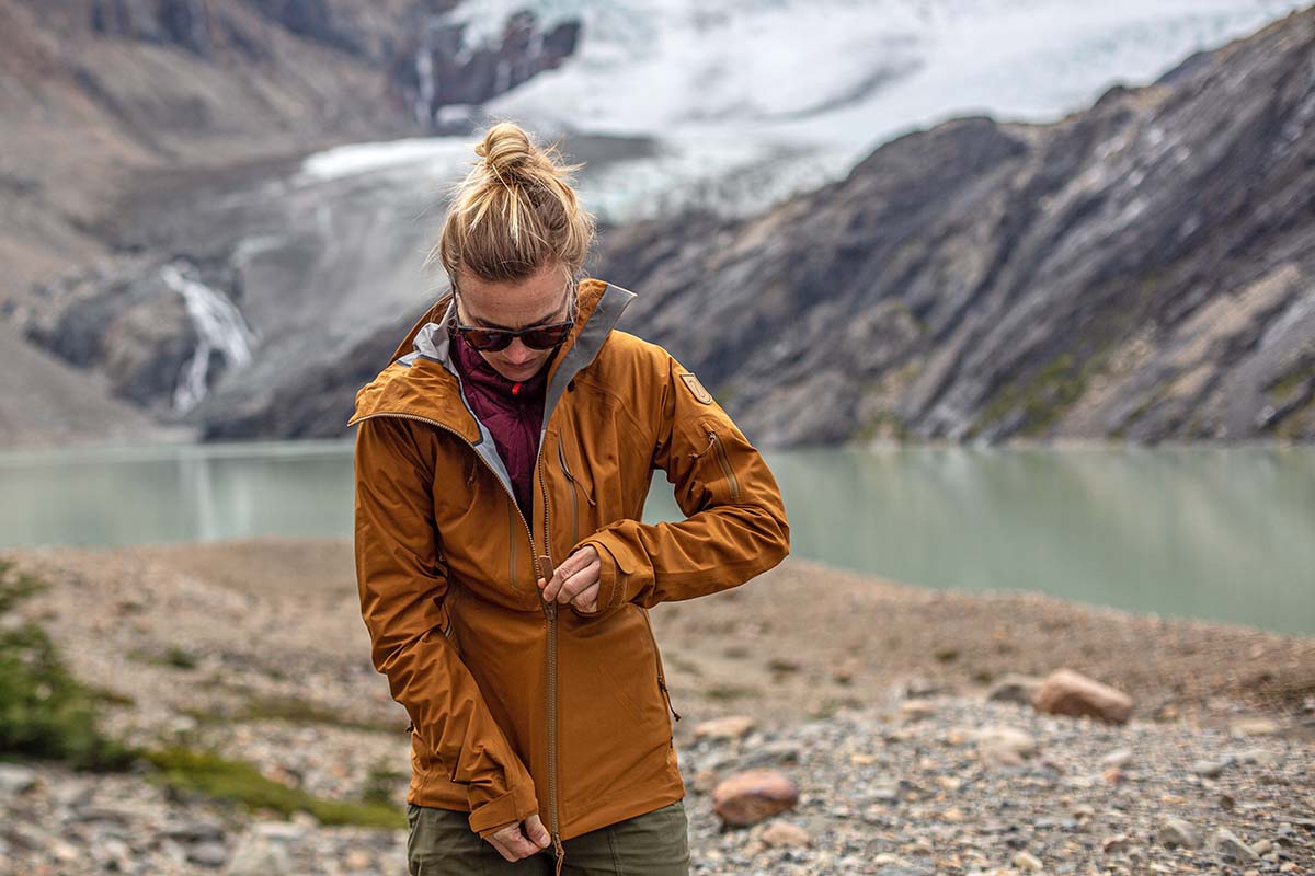 Fjallraven Keb Eco-Shell jacket (zipping up in front of glacier)